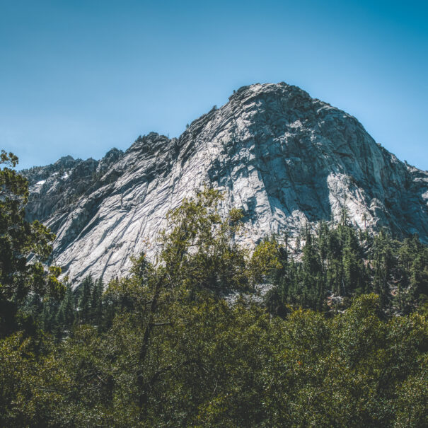 Beautiful view of majestic Tahquitz Peak on a clear sunny spring day with patches of snow remaining from the winter, Devils Slide Trail, San Jacinto Wilderness, Idyllwild-Pine Cove, California